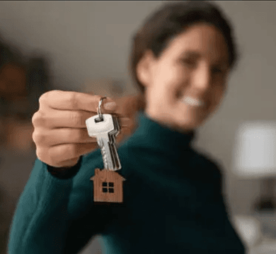 Real estate hospitality professional assisting a resident in a premium lobby