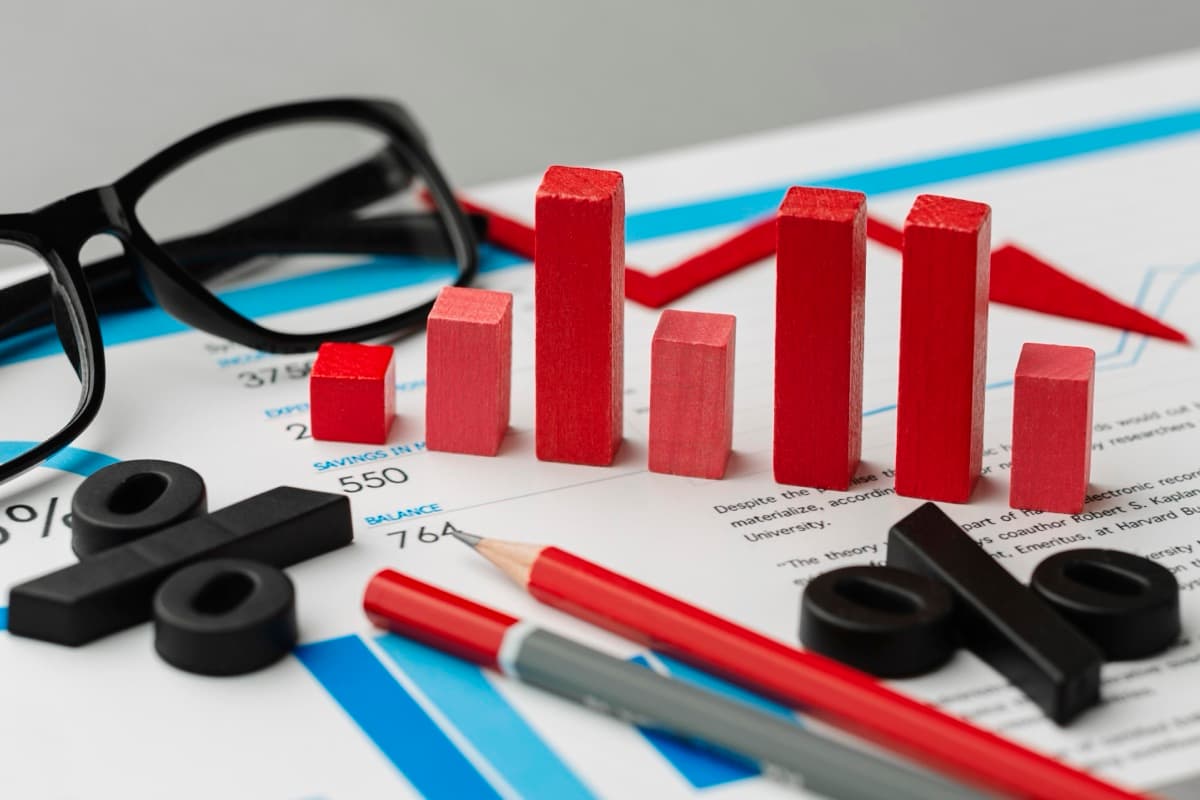 Business-case chart with data bars and financial documents, representing quantified savings